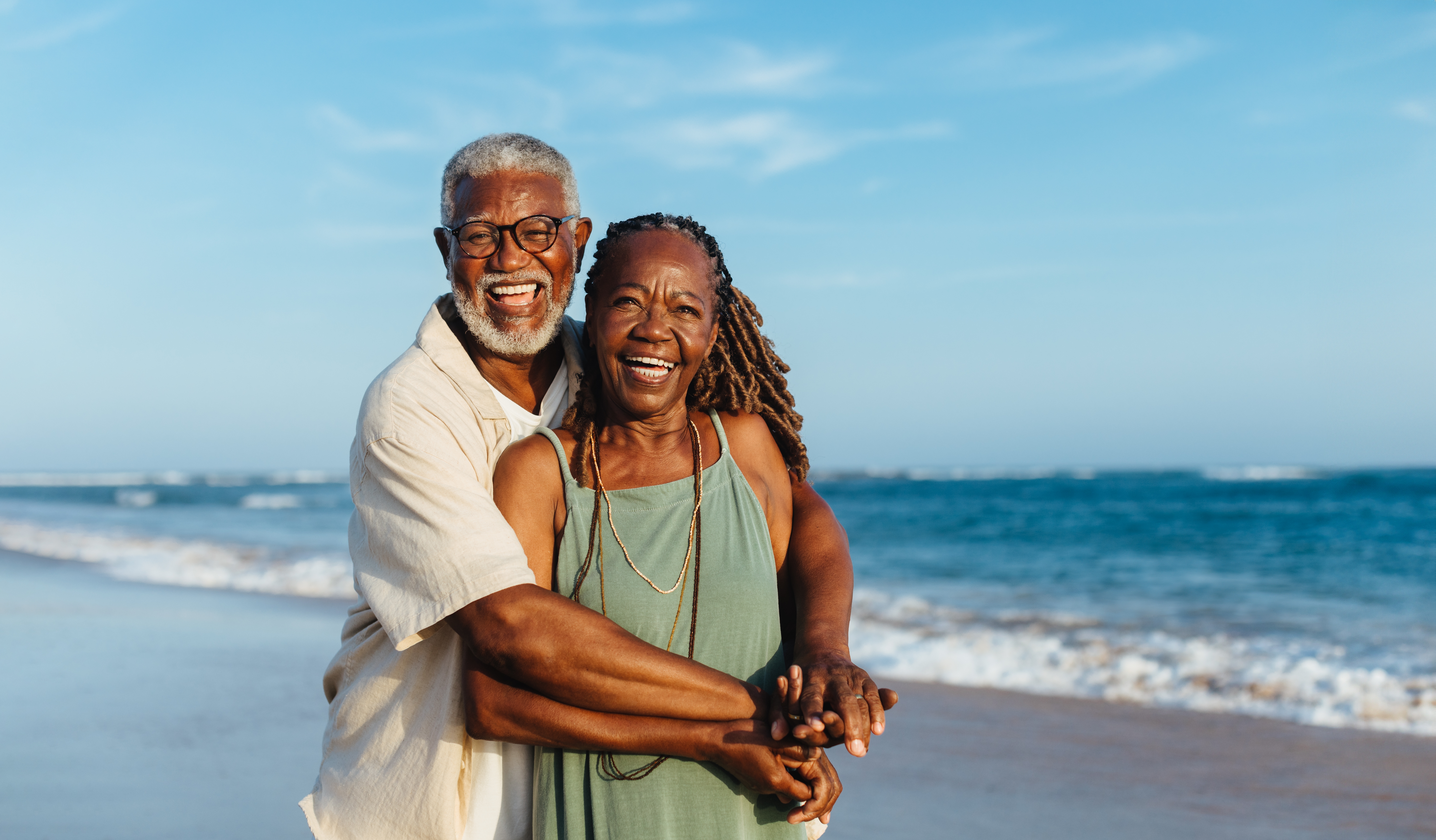 older african american couple embracing