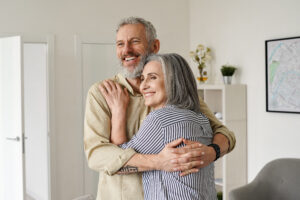 happy mature couple hugging