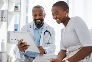 doctor and patient talking over test results 