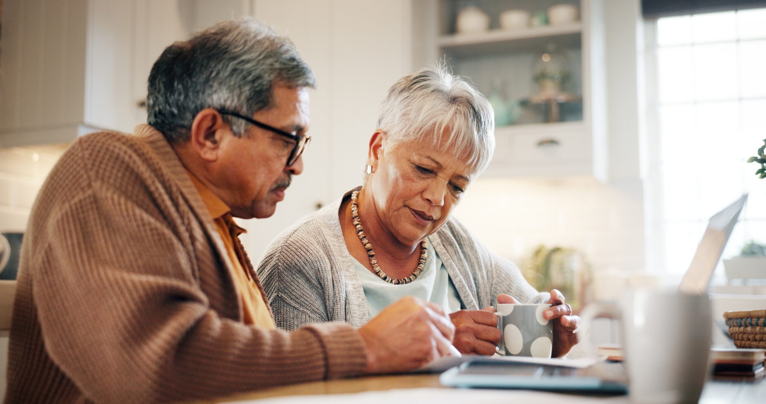 senior couple on laptop