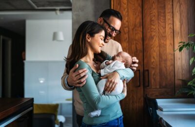 couple holding new baby