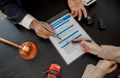 lawyer explaining the details of car insurance document